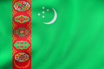 Flag of Turkmenistan waving, real fabric texture