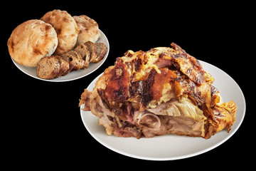 Spit Roasted Pork Ham With Baguette And Pitta Bread Loafs Isolated On Black Background
