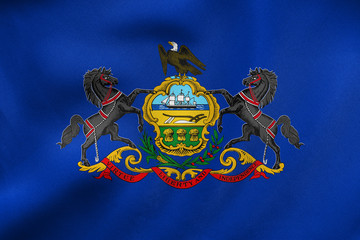 Flag of Pennsylvania waving, real fabric texture