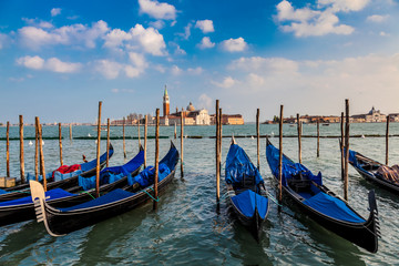 Fototapeta na wymiar Gondolas and San Giorgio Maggiore Island, Venice, Italy