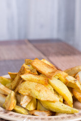 Roasted potatoes served on a plate