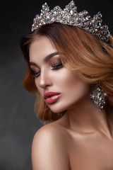 Beauty woman with beautiful make-up color, crown on his head  .
