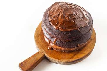 step by step coating a cake with cream of the walnut and Chocola