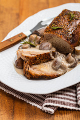 Roasted Pork Loin Tenderloin with Mushroom. Selective focus.