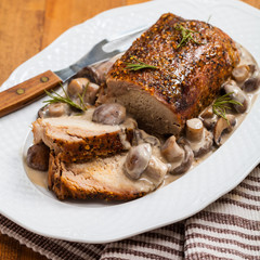 Roasted Pork Loin Tenderloin with Mushroom. Selective focus.