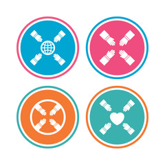 Teamwork icons. Helping Hands with globe and heart symbols. Group of employees working together. Colored circle buttons. Vector