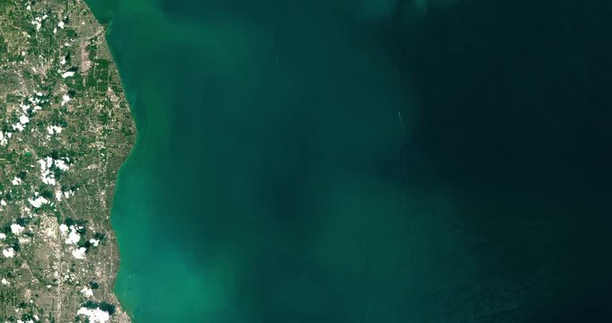 High-altitude overflight aerial of an algae bloom in Lake Erie. Clip loops and is reversible. Elements of this image furnished by USGS/NASA Landsat 

