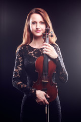 Fototapeta na wymiar Woman violin player violinist beautiful portrait