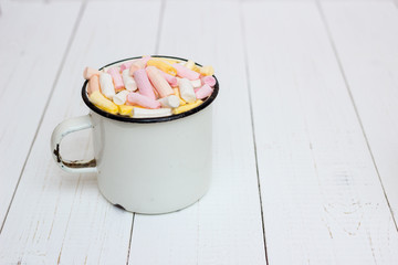 Cup of hot cocoa with color marshmallow