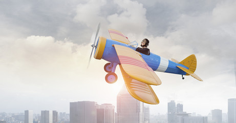 Woman in drawn airplane . Mixed media