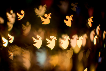 Blurred lights bokeh background of angels