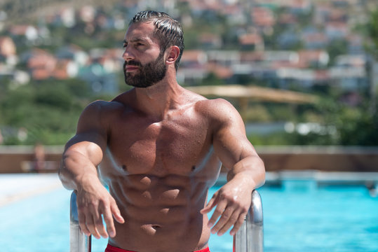 Sexy Man In The Swimming Pool