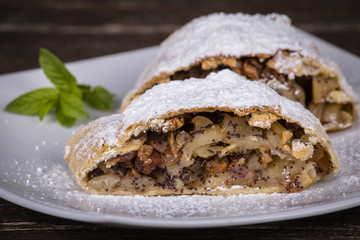 Slice of an apple strudel on a plate