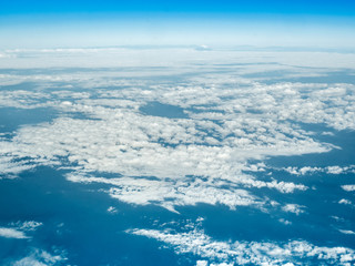Naklejka na ściany i meble Blue perfect sky sea of clouds from high altitude space background