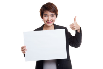 Young Asian business woman show thumbs up with  white blank sign