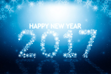 Happy New Year 2017 greeting card. Snowflake and winter background with 2017 text new year 
