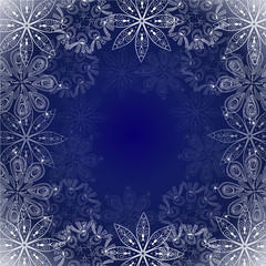 Ornament with white snowflakes on abstract blue background