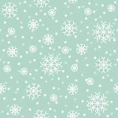  Christmas vector seamless pattern. White snowflakes on a light blue background.