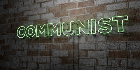 COMMUNIST - Glowing Neon Sign on stonework wall - 3D rendered royalty free stock illustration.  Can be used for online banner ads and direct mailers..