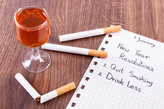 New years resolutions, quit smoking, drink less alcohol - Powered by Adobe