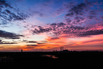 Naklejka premium evening sky in industrial area