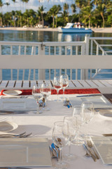 festive table in the gazebo at sunset