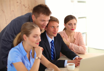 Business meeting - manager discussing work with his colleagues