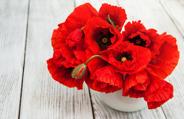 Red poppies in a vase