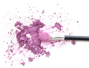 Make-up brush with colorful crushed eyeshadows