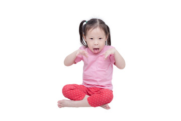 Little asian girl sitting over white background