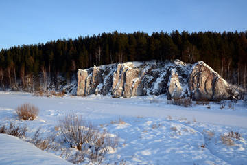 Winter view of the cliff "Shaitan Rock" on the Chusovaya River.