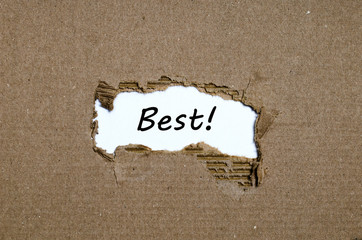 The word best appearing behind torn paper