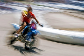 Blurred motion motorcyclist