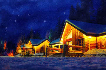 Snowy winter scene of a cabin