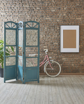 brick wall concept with paravane and bike