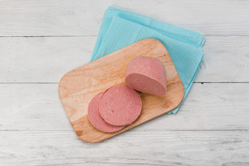 cooked boiled ham sausage. Top view.