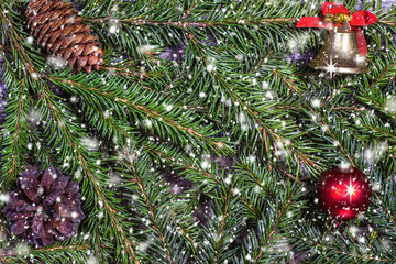 Christmas decoration with pine cones and balls with snowflakes