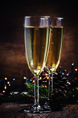 Champagne in glasses, Christmas or New Year's composition with f