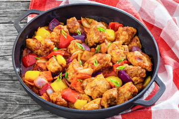 Sweet and Sour crispy fried pork pieces, close-up