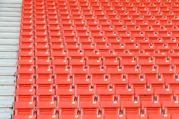Empty orange seats at stadium,Rows of seat on a soccer stadium