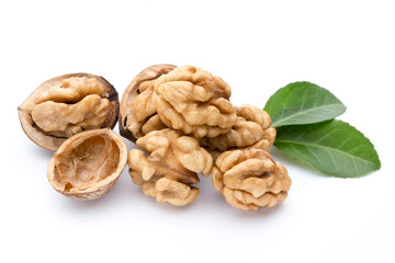 Walnut and walnut kernel isolated on the white background.