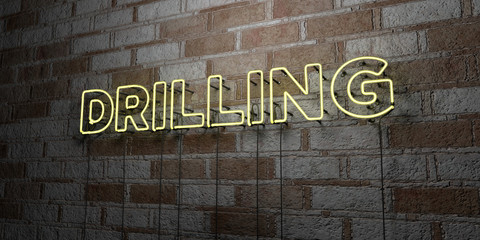 DRILLING - Glowing Neon Sign on stonework wall - 3D rendered royalty free stock illustration.  Can be used for online banner ads and direct mailers..