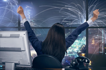 Asian business woman happy looking window because this is new year