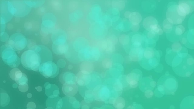 Bokeh background with floating translucent bubbles against a green teal backdrop.
