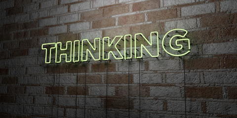 THINKING - Glowing Neon Sign on stonework wall - 3D rendered royalty free stock illustration.  Can be used for online banner ads and direct mailers..