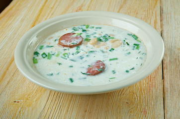 Soup with beans, sour cream and sausage