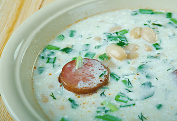 Soup with beans, sour cream and sausage