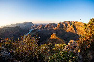 Blyde River Canyon, famous travel destination in South Africa. Last sunlight on the mountain ridges. Fisheye view from above.