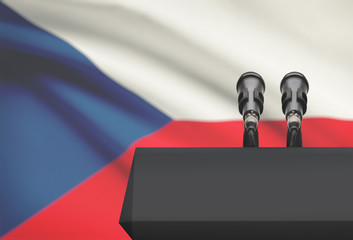 Pulpit and two microphones with a national flag on background - Czech Republic