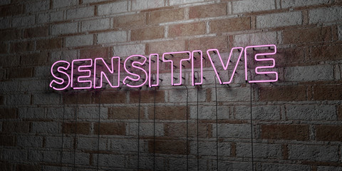 SENSITIVE - Glowing Neon Sign on stonework wall - 3D rendered royalty free stock illustration.  Can be used for online banner ads and direct mailers..